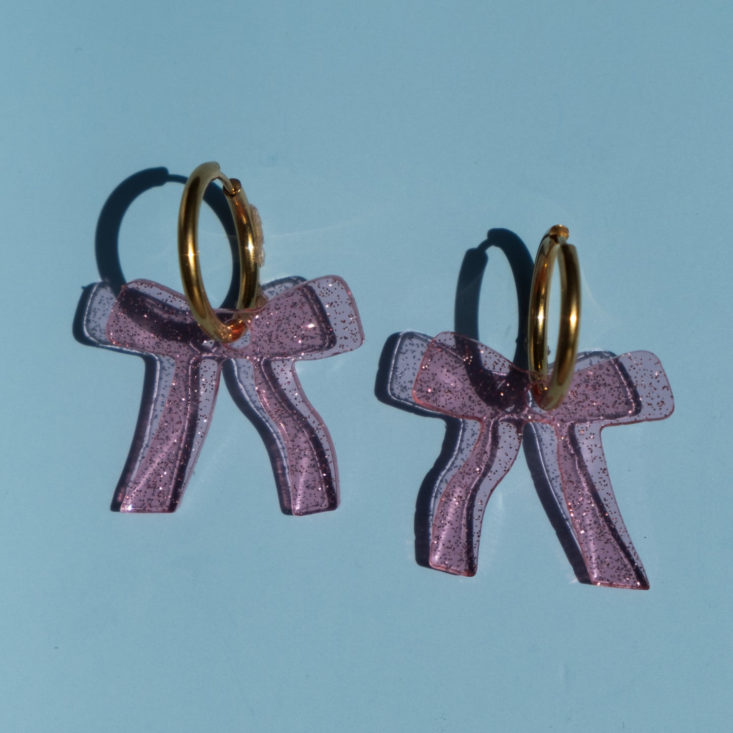 Sparkly Pink Bow Hoop Earrings